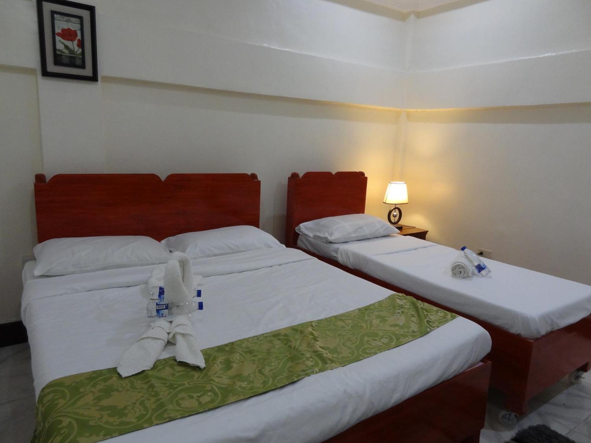 The Executive Villa Inn & Suites Davao Stadt Zimmer foto