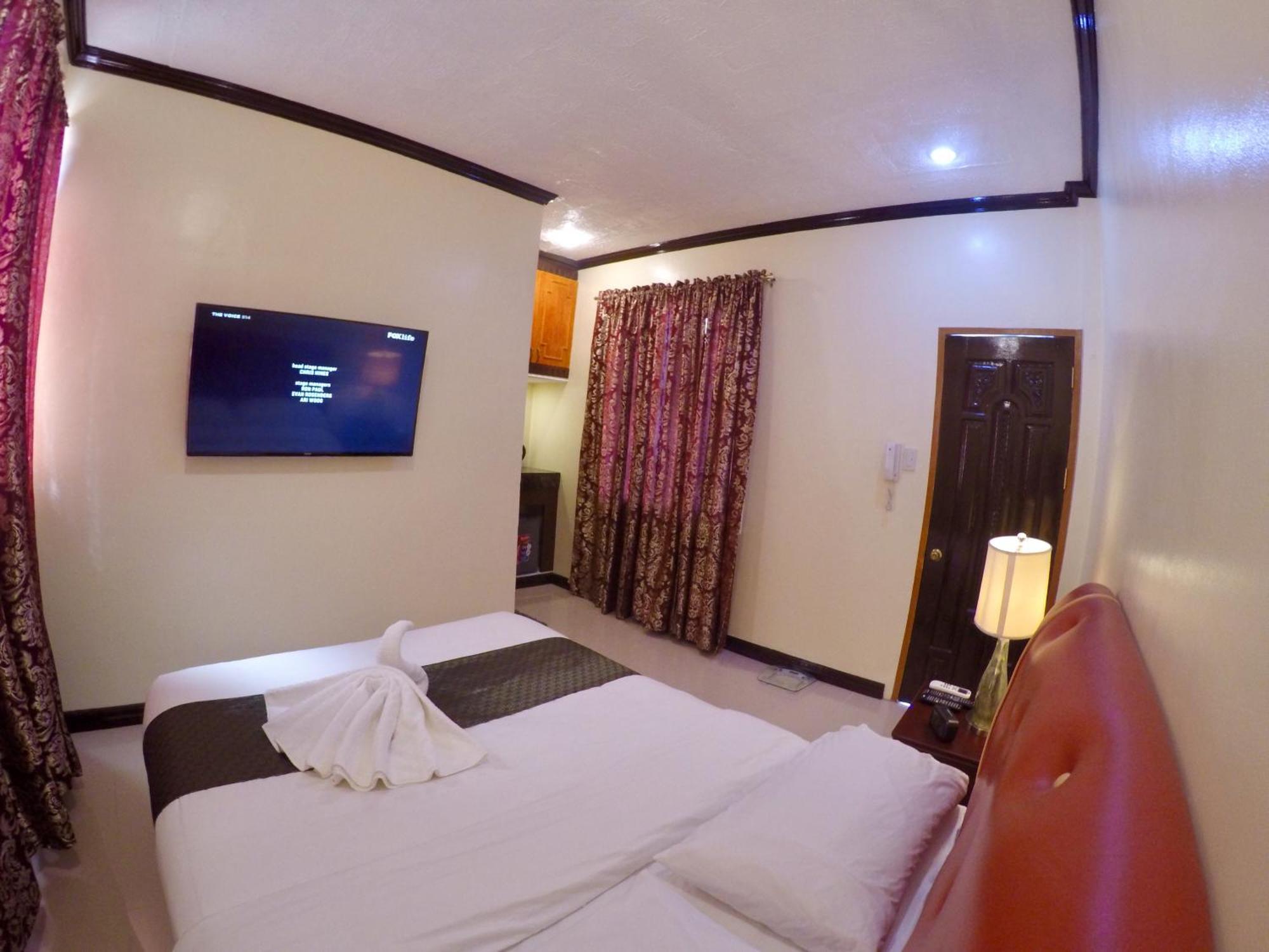 The Executive Villa Inn & Suites Davao Stadt Zimmer foto